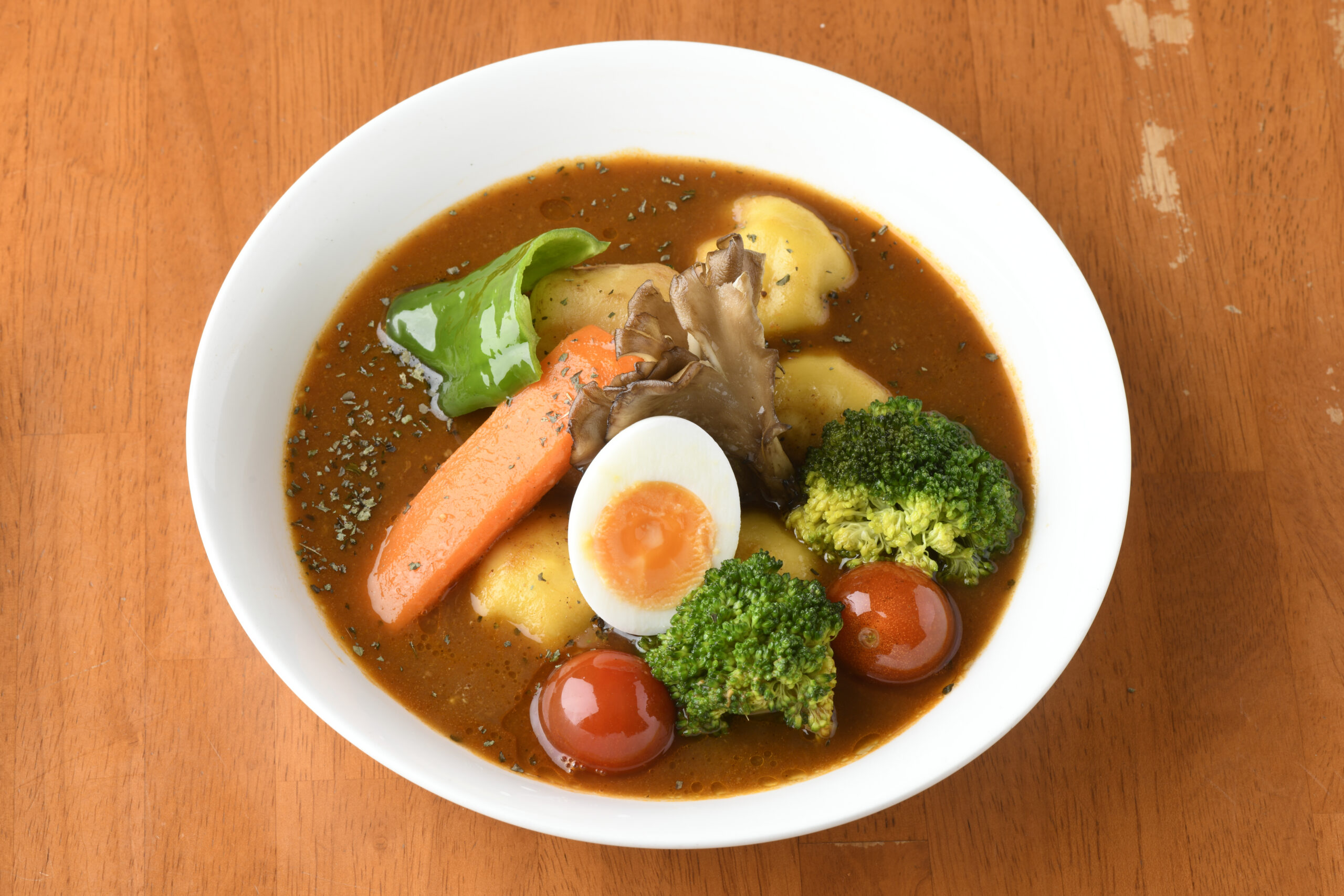 小籠包風肉汁ラビオリと野菜のスープカレー